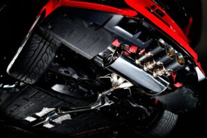 FUJITSUBO「ロードスター12Rにオプション設定される A-RMチタニウムモデルやFD3S用レガリスも展示」東京オートサロン - P61-12-