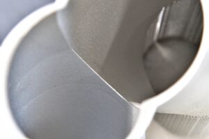 FUJITSUBO「ロードスター12Rにオプション設定される A-RMチタニウムモデルやFD3S用レガリスも展示」東京オートサロン - P60-07